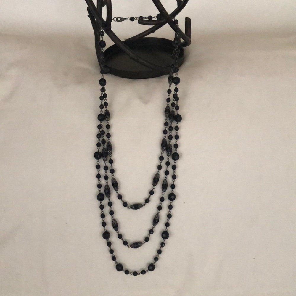 BLACK BEADED TRIPLE STRAND NECKLACE